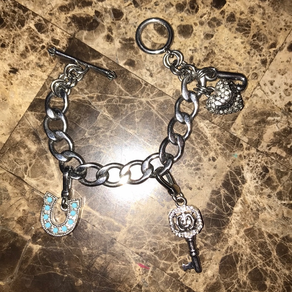 Juicy couture bracelet with 2 extra charms !